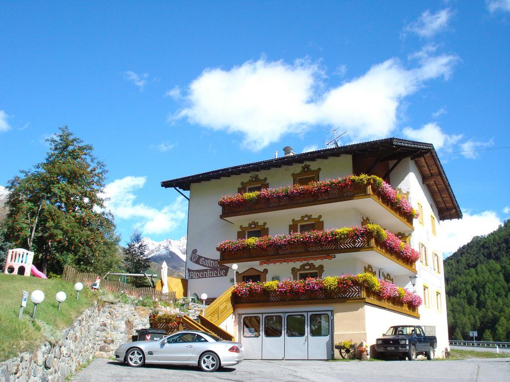 Hotel Alpenfriede Curon Venosta Bagian luar foto